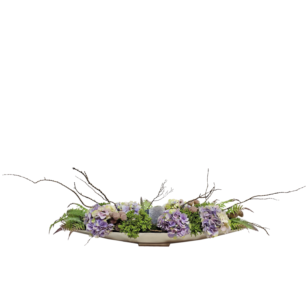 Hydrangeas, Large Amethyst Crystal, Ferns, Figs and Tiger Wood in Metal Boat 17"H