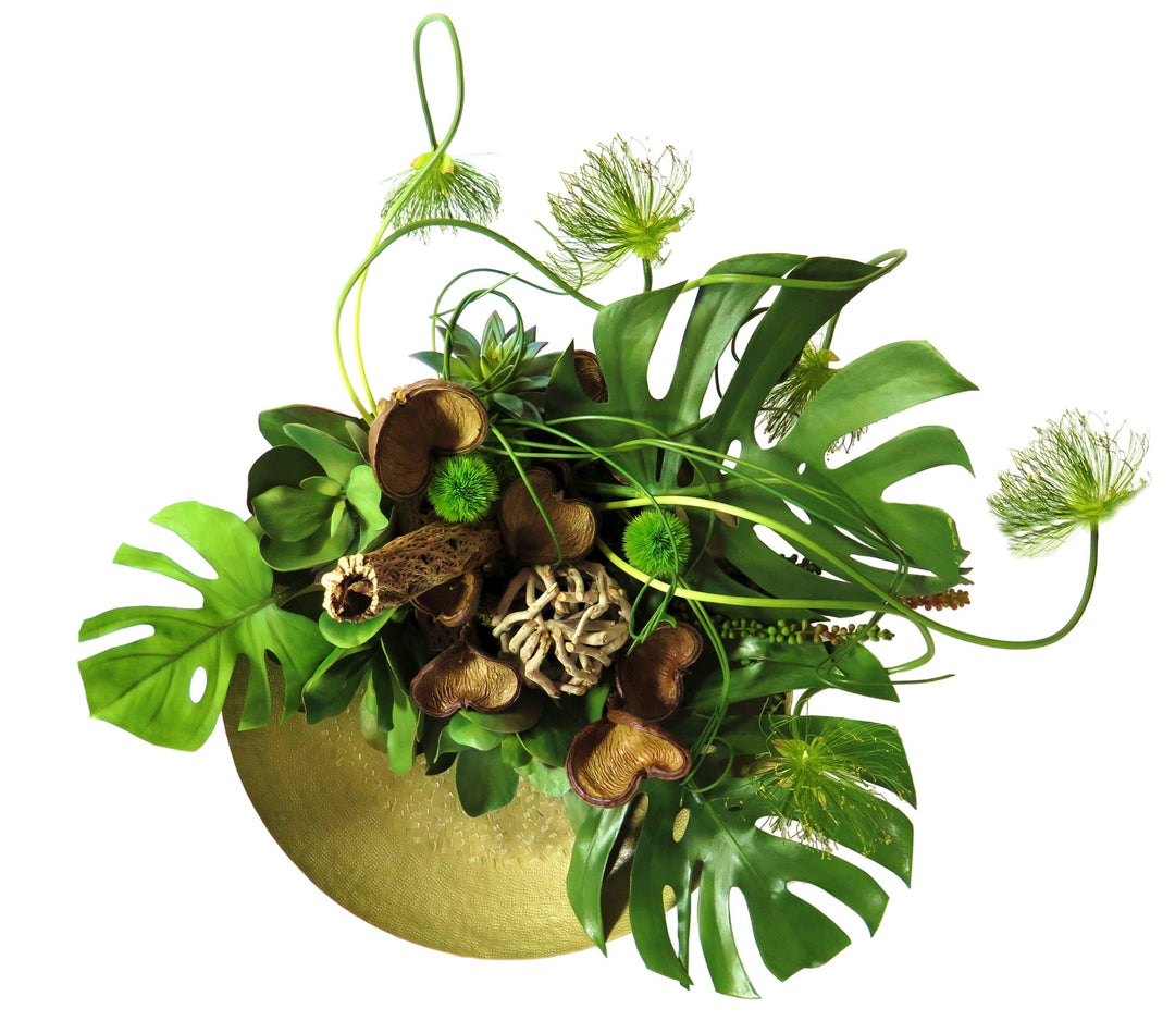 Monstera Leaves with Cypress Grass and Badam Nut Pods in Bowl