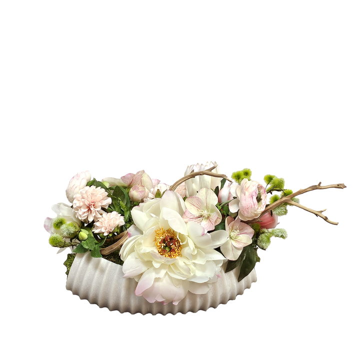 Dahlia, Peony, Protea, Ranunculus, Magnolia Pick, and Manzanita Branch in Ribbed Bowl. 10"H