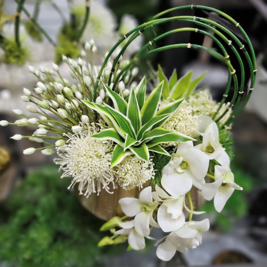 Agapanthus, Protea, Horsetail Reeds and Dendrobium Orchid in Metal Oval 11"H - LDF Silk