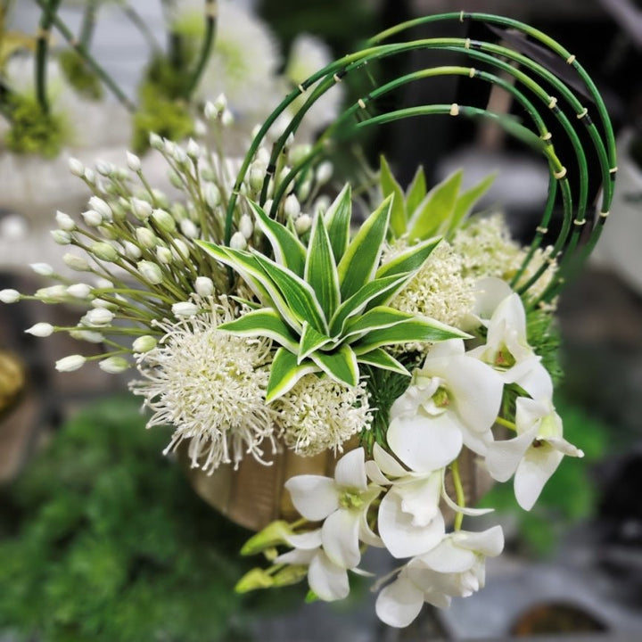 Agapanthus, Protea, Horsetail Reeds and Dendrobium Orchid in Metal Oval 11"H - LDF Silk
