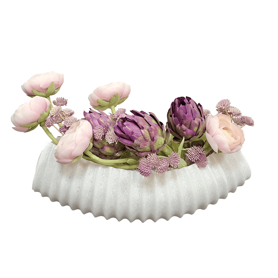 Protea, Ranunculus, and Mini Flowers with Pink Rock in Carved Stone Oval Bowl 7.5"H - LDF Silk