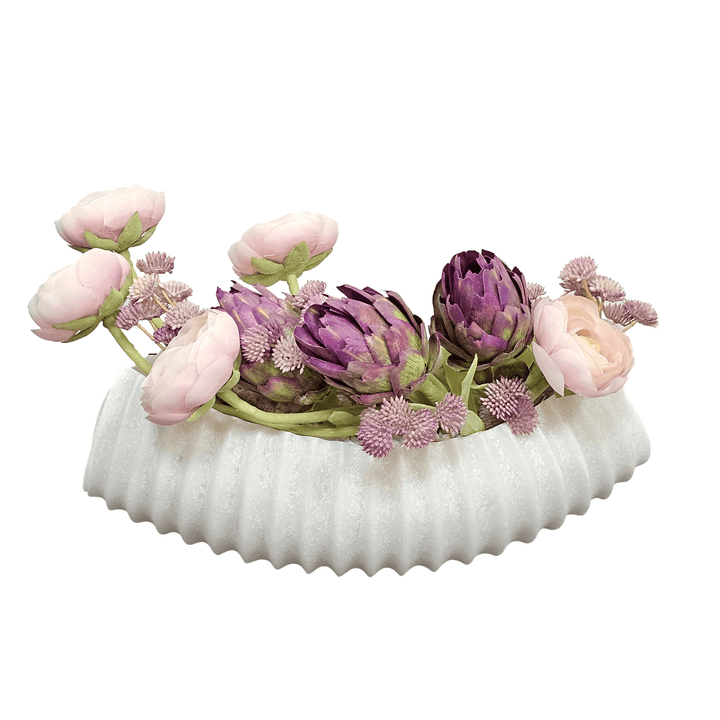 Protea, Ranunculus, and Mini Flowers with Pink Rock in Carved Stone Oval Bowl 7.5"H - LDF Silk