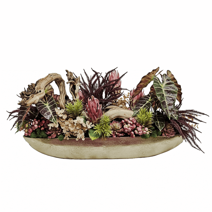 Sculptural Wood with Tropical Leaves, Eucalyptus, Succulents, Berris and Protea in a Oval Metal Boat 20"H x 44"W x 17"D - LDF Silk