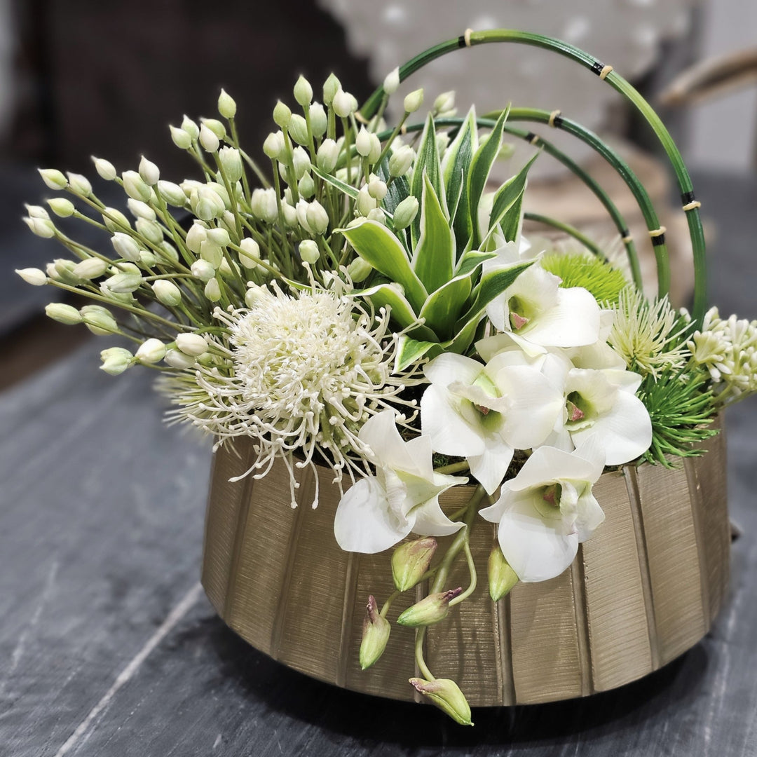 White Agapanthus, Protea, Horsetail Reeds and Dendrobium Orchid in Gold Metal Oval 11"H - LDF Silk